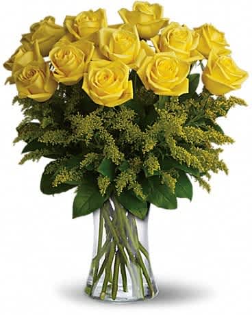 Rosy Glow Bouquet - Yellow roses symbolize friendship, and sending this sunny bouquet of bright yellow flowers is such a beautiful way to celebrate a special bond. Destined to make anyone's day glow, these roses are brilliant! Glowing yellow roses and solidago mixed with greens are delivered in a clear glass gathering vase. Sunny skies ahead!Approximately 16" W x 20" H