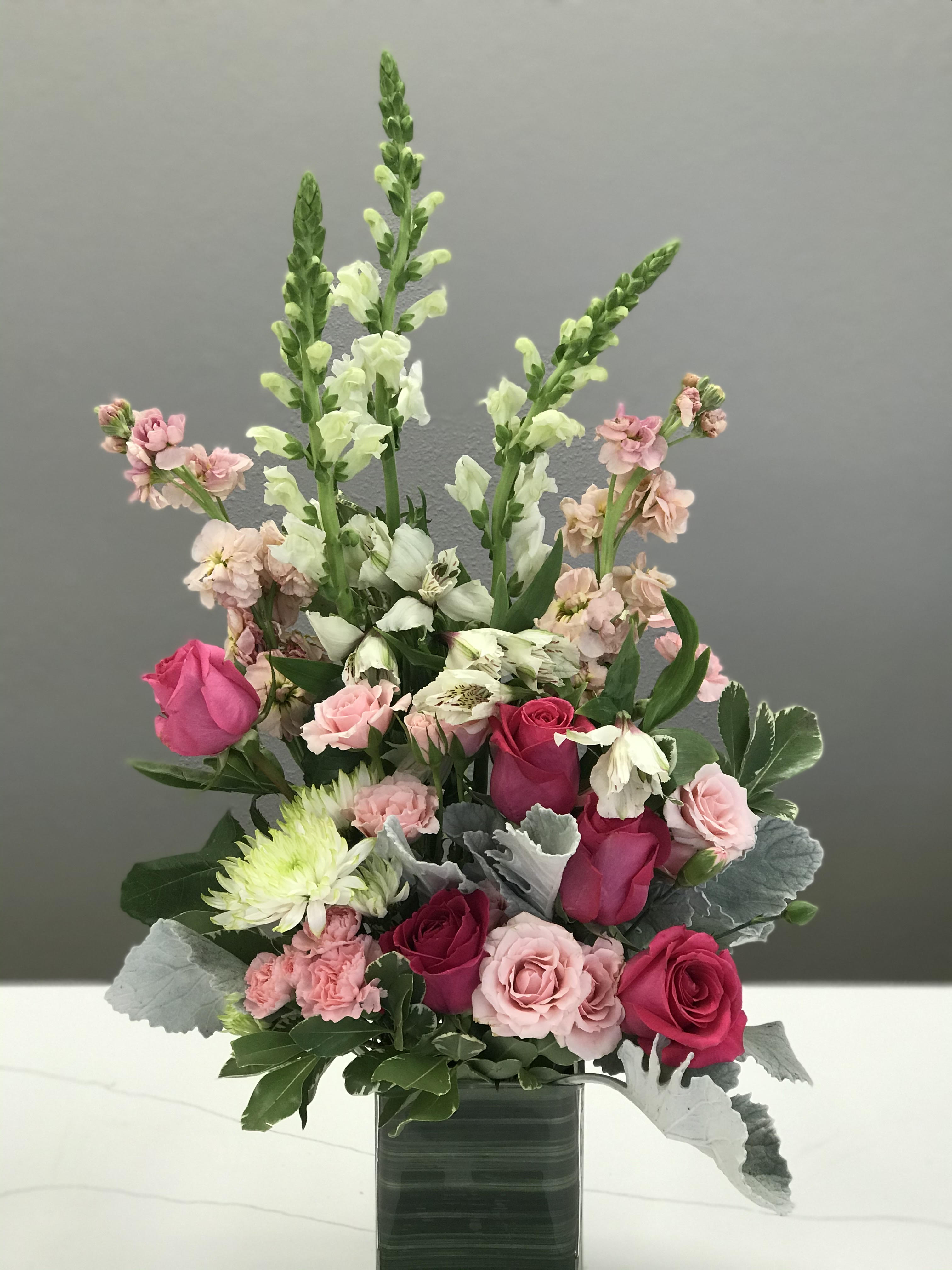 Queen's Castle - With drama coming from height and color this stunner is destined to celebrate someone unique and cherished. Never miss an opportunity to let them know how special they are to you. 