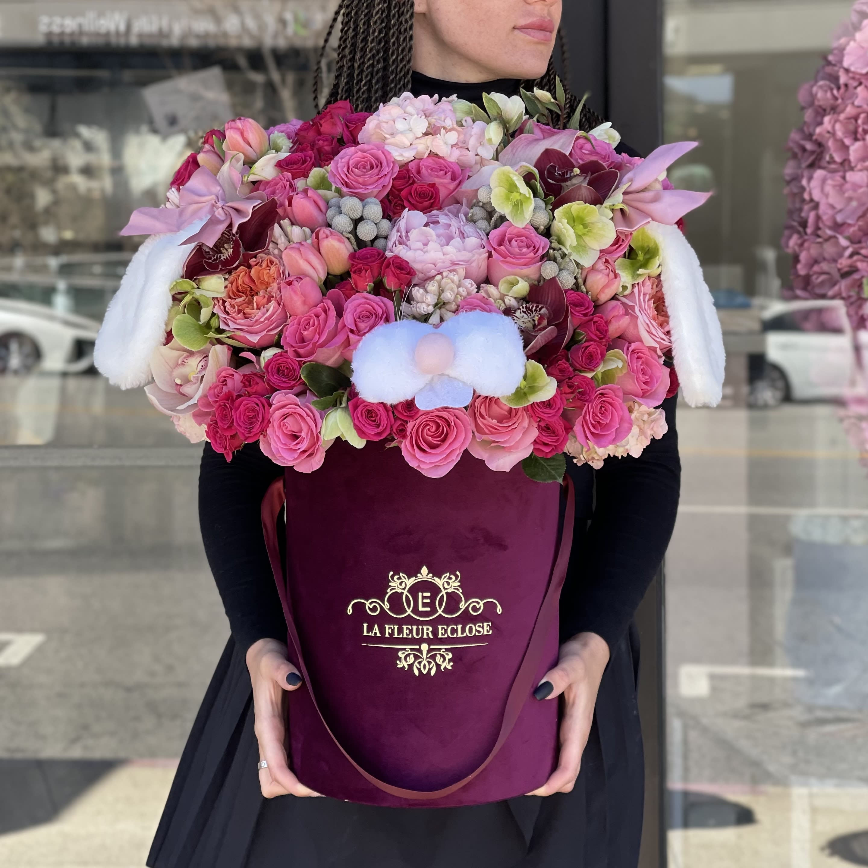 Blooming Personality - Premium selection of flowers in a burgundy velvet signature box. Bunny nose and ears included. 