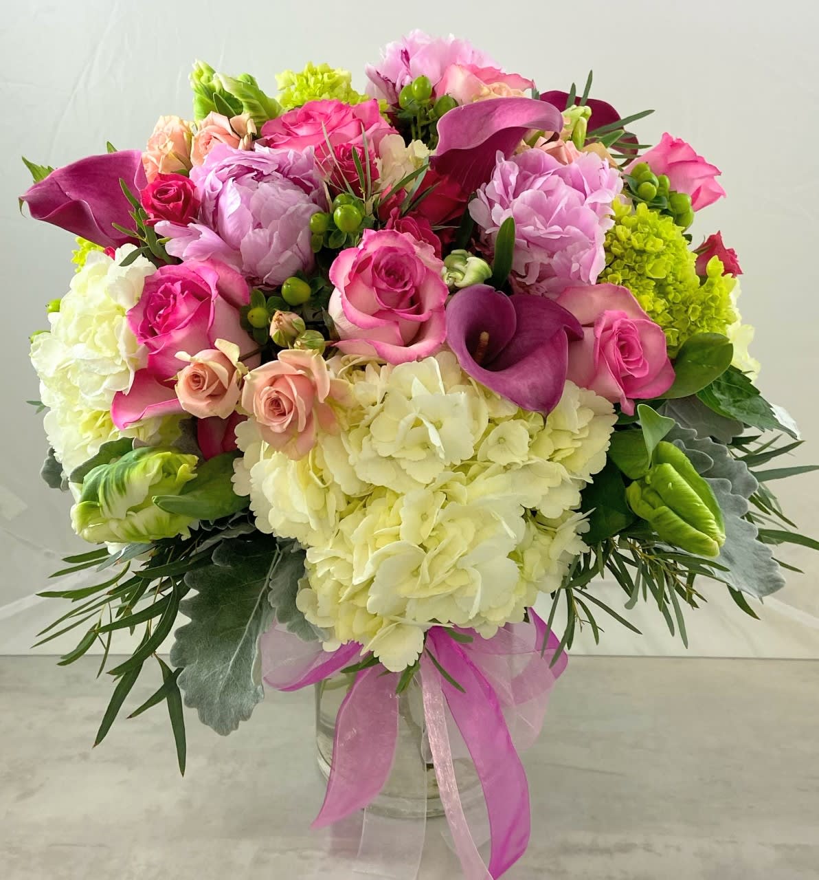 Affair Of The Heart Bouquet - Grace, beauty and tenderness are words to describe this enchanting bouquet. Your loved one will be overwhelmed when presented with your gift. Let them know you care to send only the best.