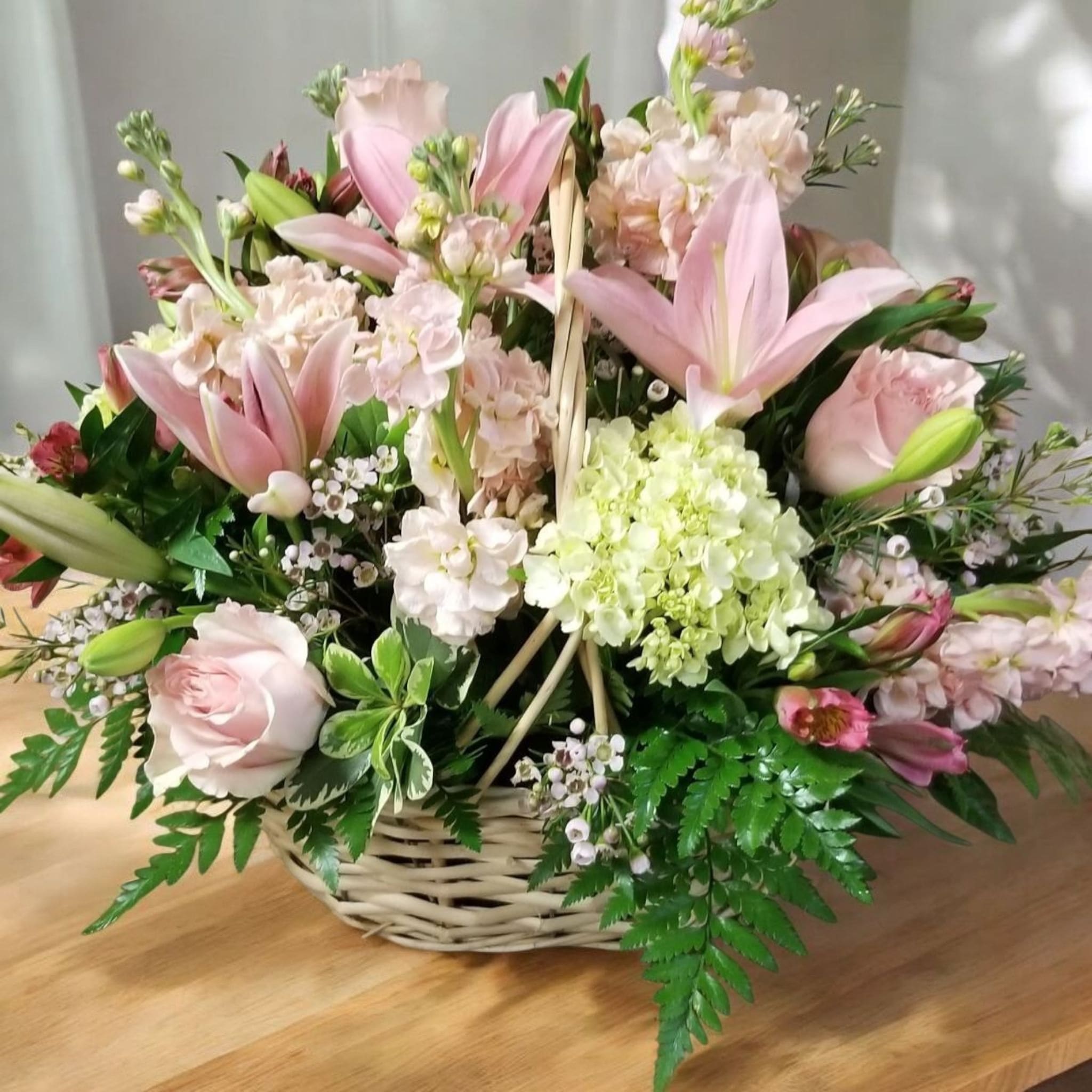 Spring Basket - Spring arrangement with assorted sweet color of flowers