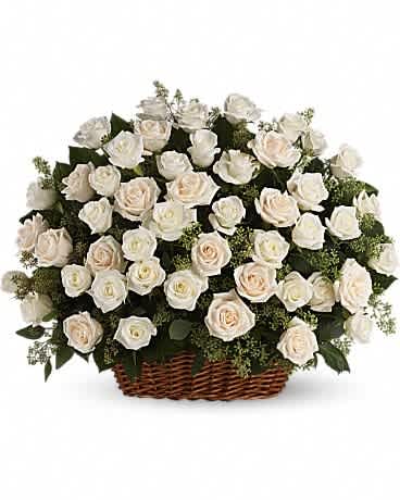 Bountiful Rose Basket for Sympathy - A beautiful, bountiful basket of luminous white roses that feels so fresh, natural, and welcomed in a home or at a service. White and cream roses with fragrant seeded eucalyptus beautifully presented in a large basket.