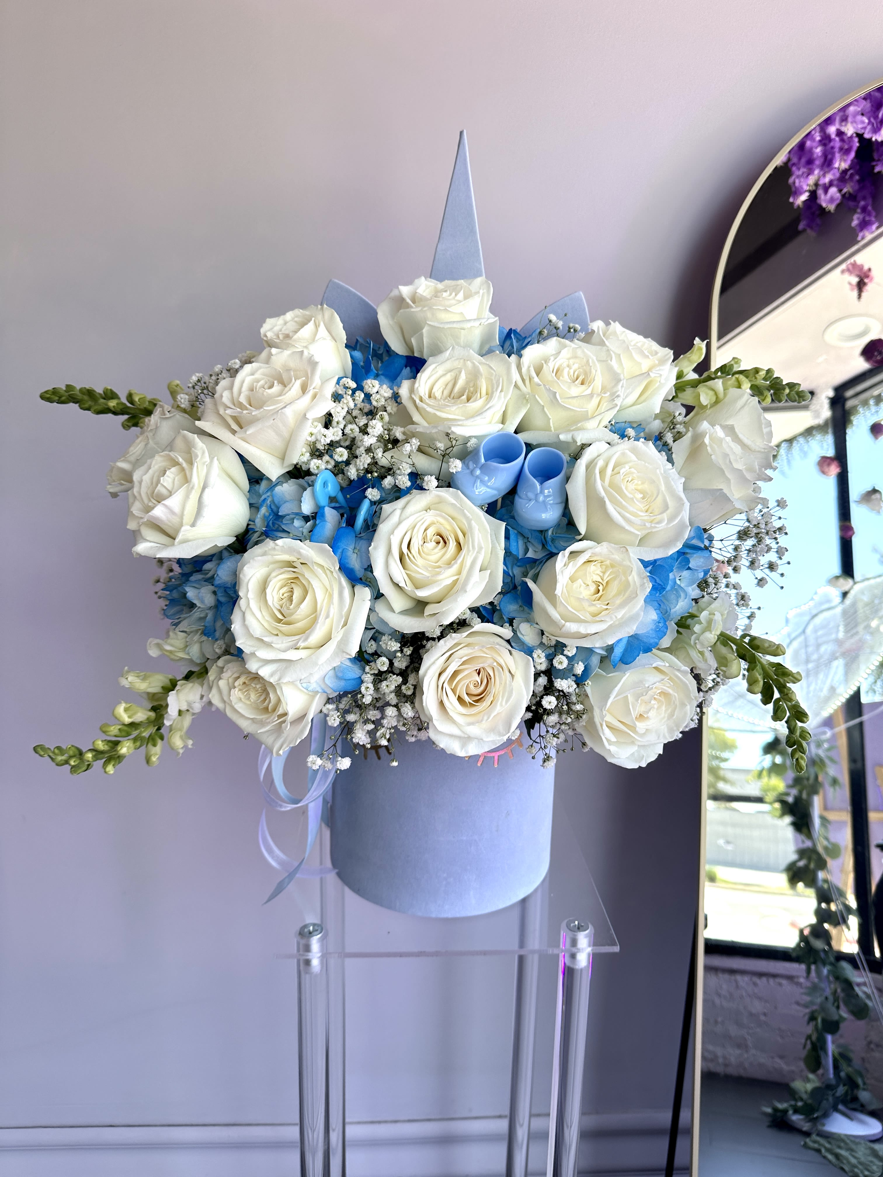 67D- Unicorn Blue / Pink  - Welcome, baby boy/girl arrangement.  Available in pink and blue colors.  DELUXE size is in the photo.