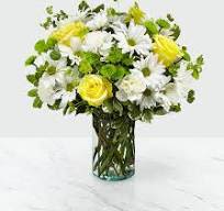 Luck of the Irish - “If it’s a little extra luck you’re after, this spirited St. Patrick’s Day arrangement is the perfect place to start. Bursting with lush greens and festive charm, this handcrafted bouquet is designed to set you on the right path—because nothing nudges good fortune your way quite like a gift of fresh, vibrant blooms.”