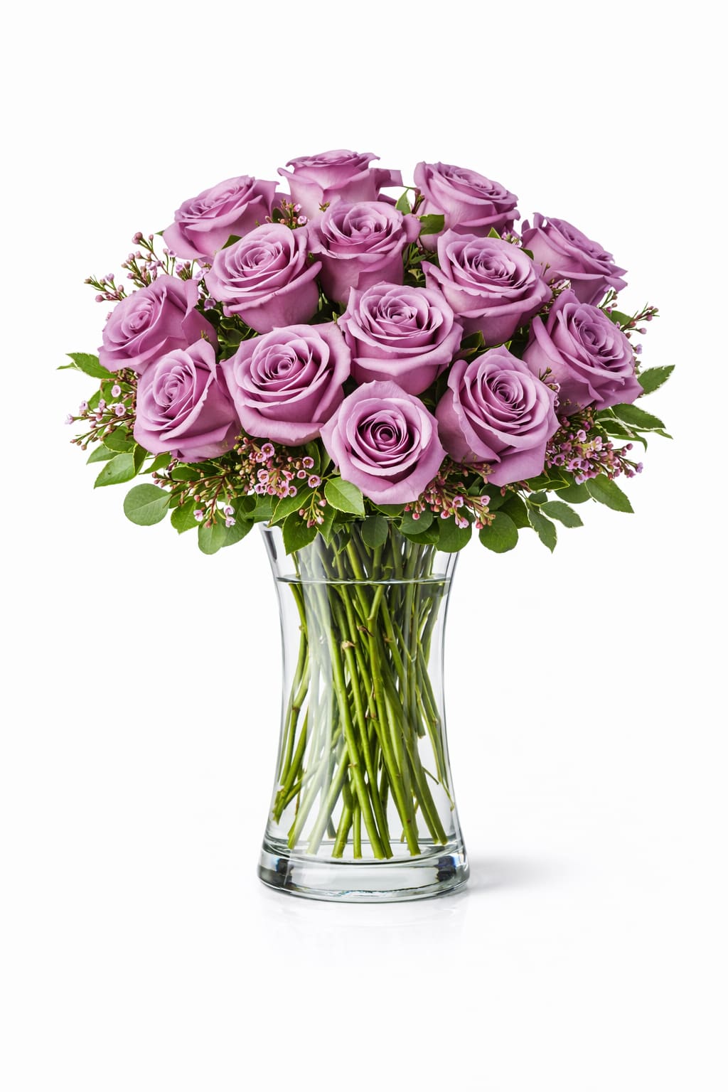 1 Dozen Lavender Roses - 12 lavender roses, with mixed greens.  *Vase/container may vary depending on availability of stock at time of purchase. *We strive to use the flowers shown whenever possible; however, substitutions of equal or greater value may be made based on seasonal and market availability. 