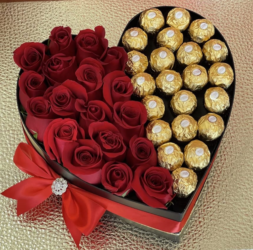 Love is Sweet   - 18 red roses plus chocolates, we can also make arrangement with different color roses by inquire. Deluxe has 30 roses plus more chocolate.