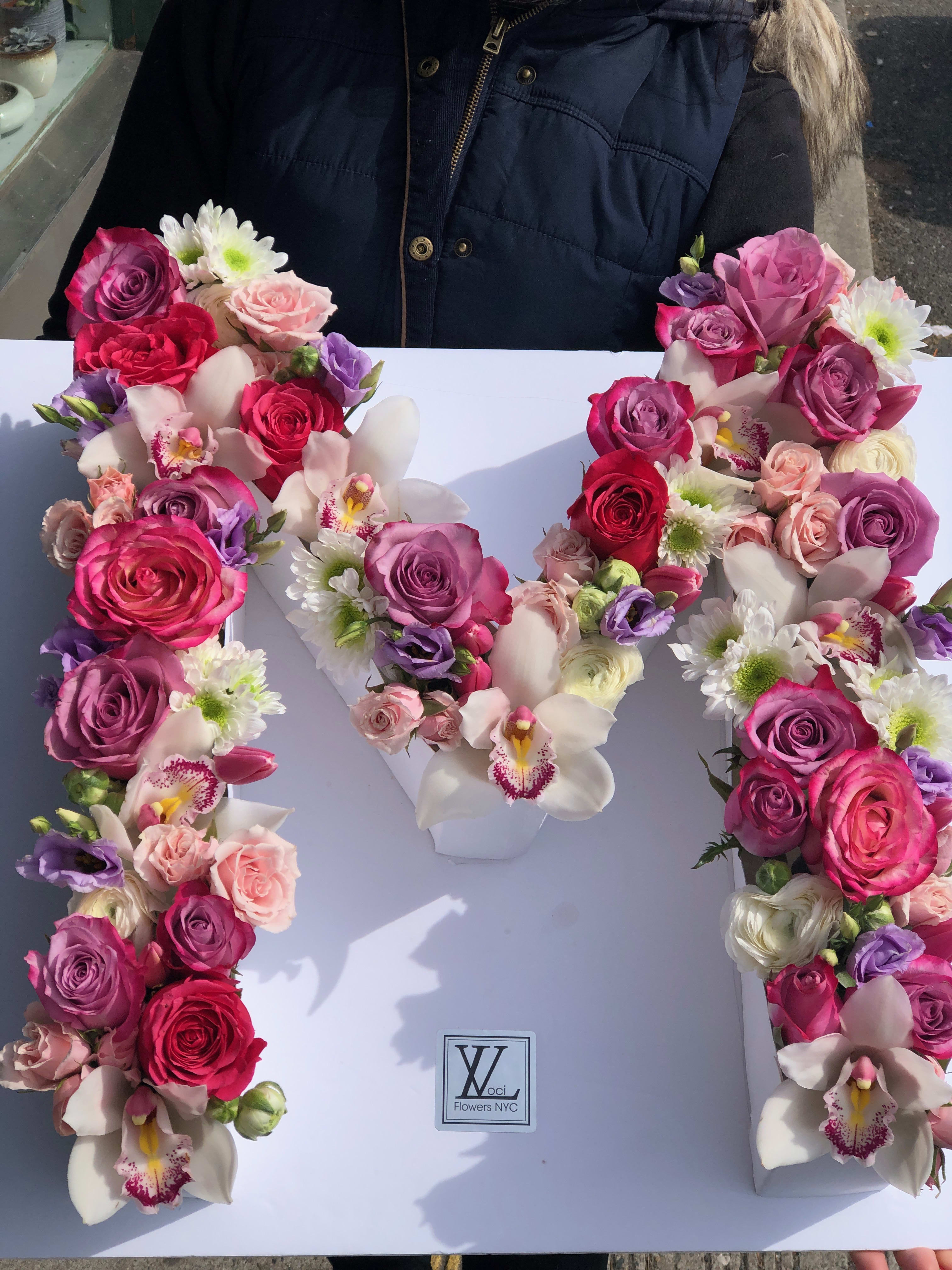 M -Customized Letter  - We create beautiful letters and numbers with fresh flowers for anniversary ,birthdays in all colors as your request .the hight of the letters its about 12" to 16"inch hight  