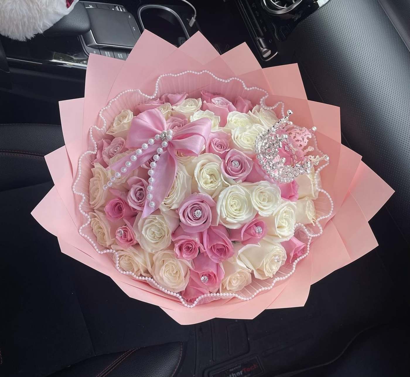 Sweet Love - Fifty pink and white roses adorned with refined pearl details.