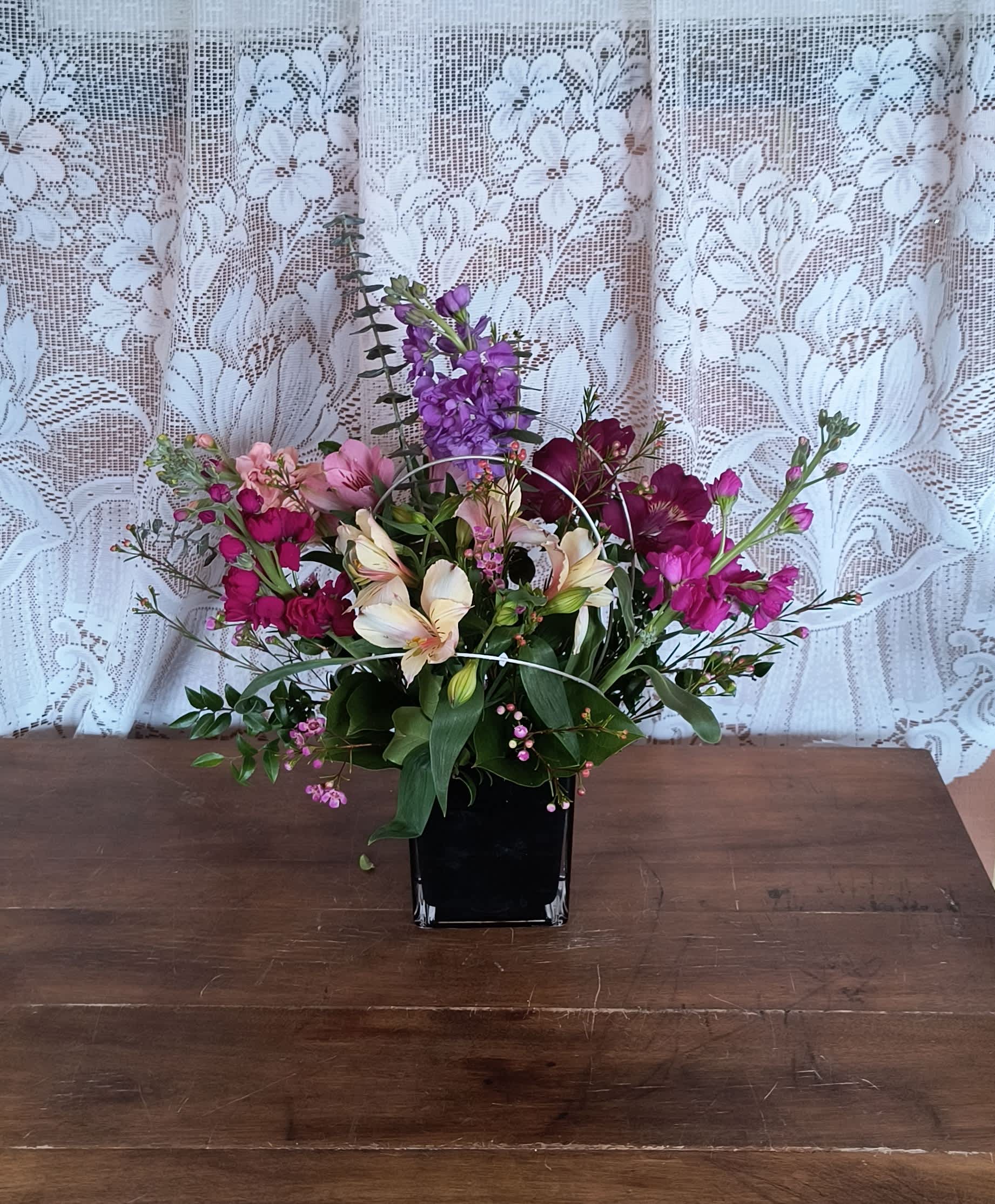 Sassy - A mix of garden flowers alstroemeria and stock in vibrant assorted colors.