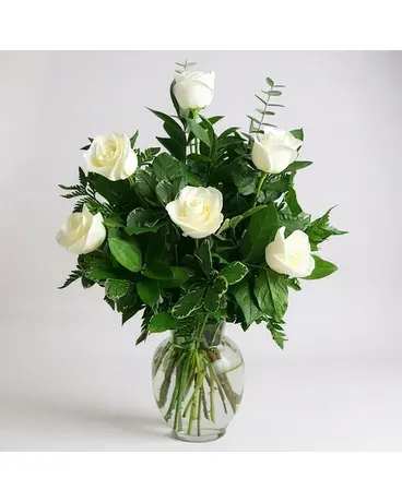 Half Dozen White Roses - Half Dozen White Roses with mixed greens in a clear vase.