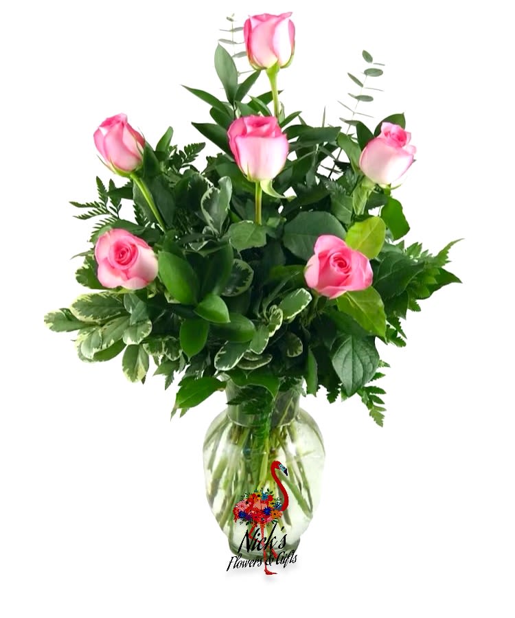 Half Dozen Pink Roses - Half Dozen Pink Roses Hand Arranged With Lush Greens in a traditional glass vase.