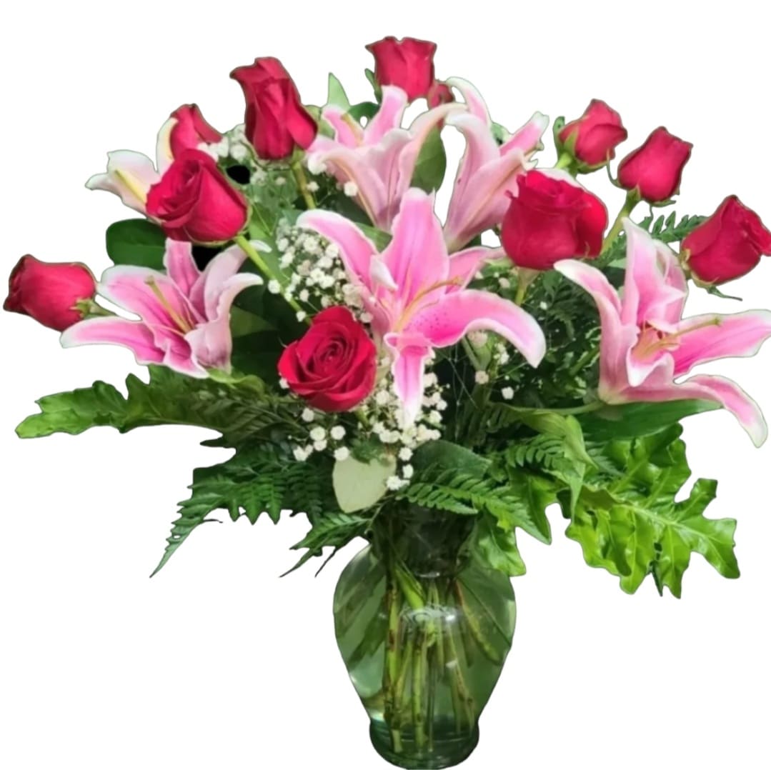 Dozen Roses Romance Bouquet - One dozen red roses with and lilies. Fill any room with the beautiful scent of this luxurious bouquet. 