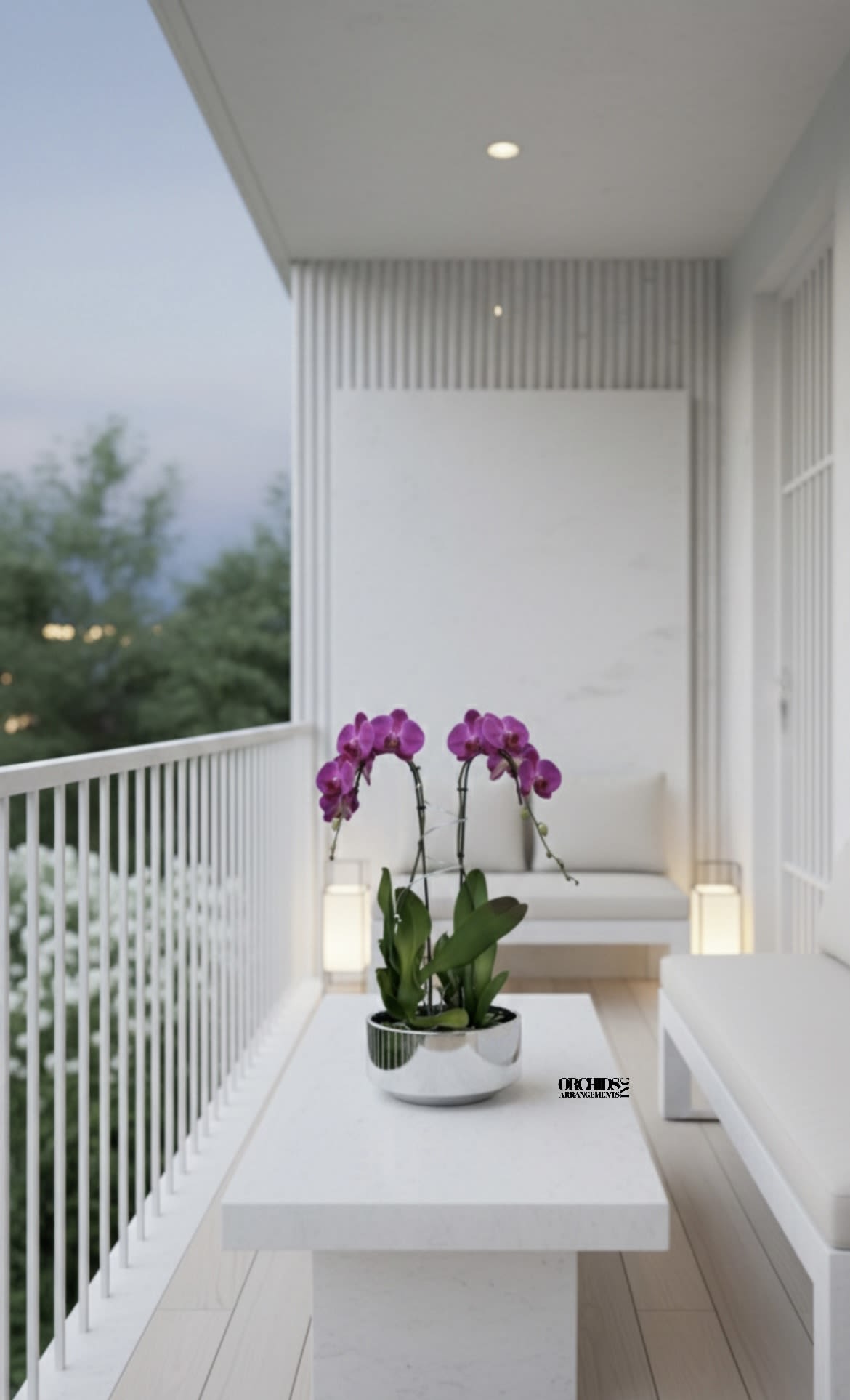 Purple Phalaenopsis Orchid – Deluxe Gift Arrangement - This elegant Double Purple Phalaenopsis Cascade orchid arrangement creates a striking vertical presence, making it ideal for grand interiors and modern living spaces with a vase 12" D X 5" T. 