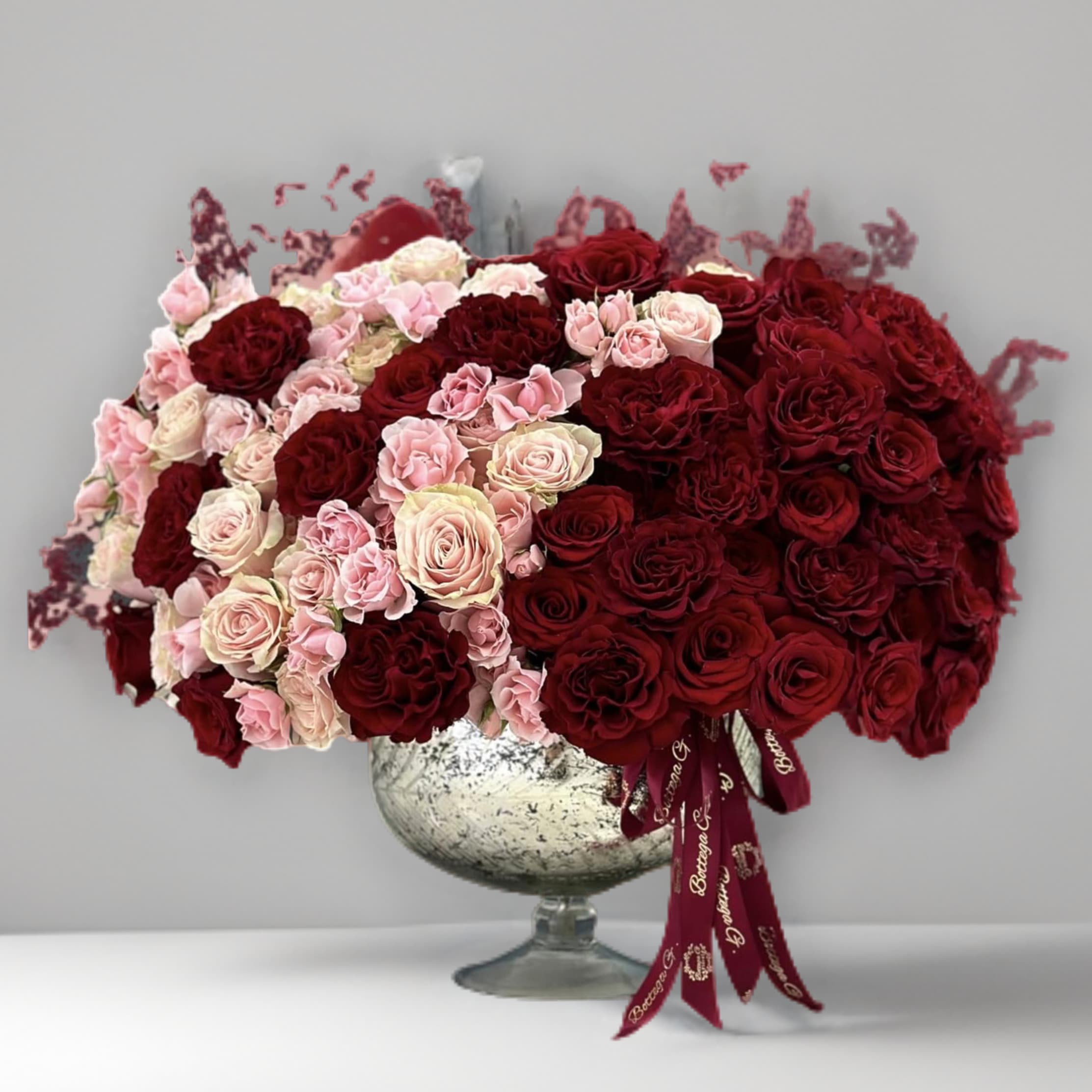 Love at First Sight - Embrace timeless romance with our stunning blend of red and pink roses. Each bloom is hand-selected for its lush petals and vibrant color, symbolizing love, admiration, and grace.