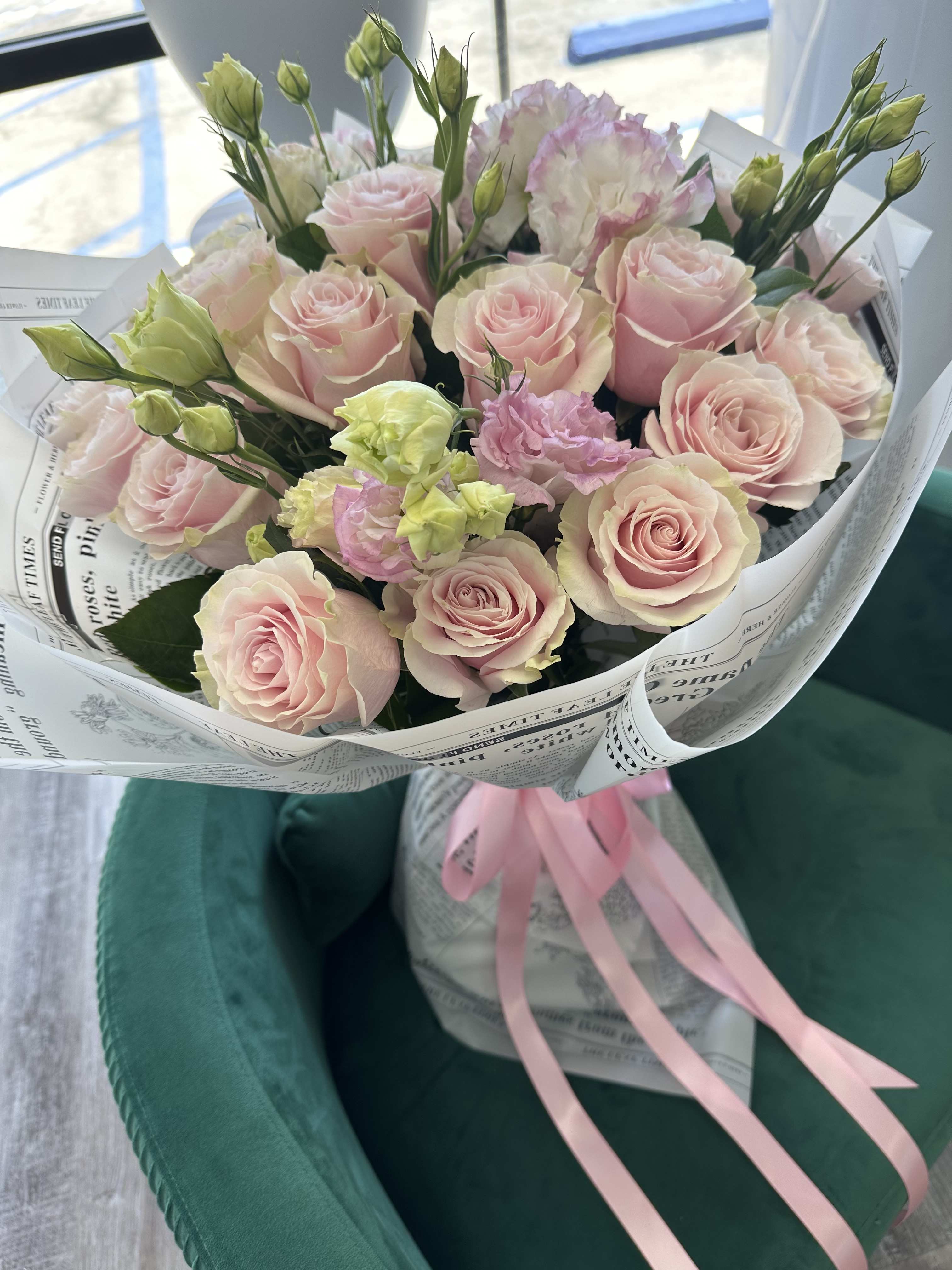 Pink Mondial Bouquet - A bouquet of light pink roses exudes elegance, grace, and admiration. Light pink roses are often associated with sweetness, joy, and gratitude, making them a perfect choice for various occasions, including graduations, birthdays, or simply to express appreciation and affection.  The soft hue of light pink roses symbolizes gentleness and admiration, making it an ideal gift to convey heartfelt emotions. Whether as a standalone bouquet or combined with other complementary flowers, a bouquet of light pink roses is sure to brighten someone's day and make them feel special.