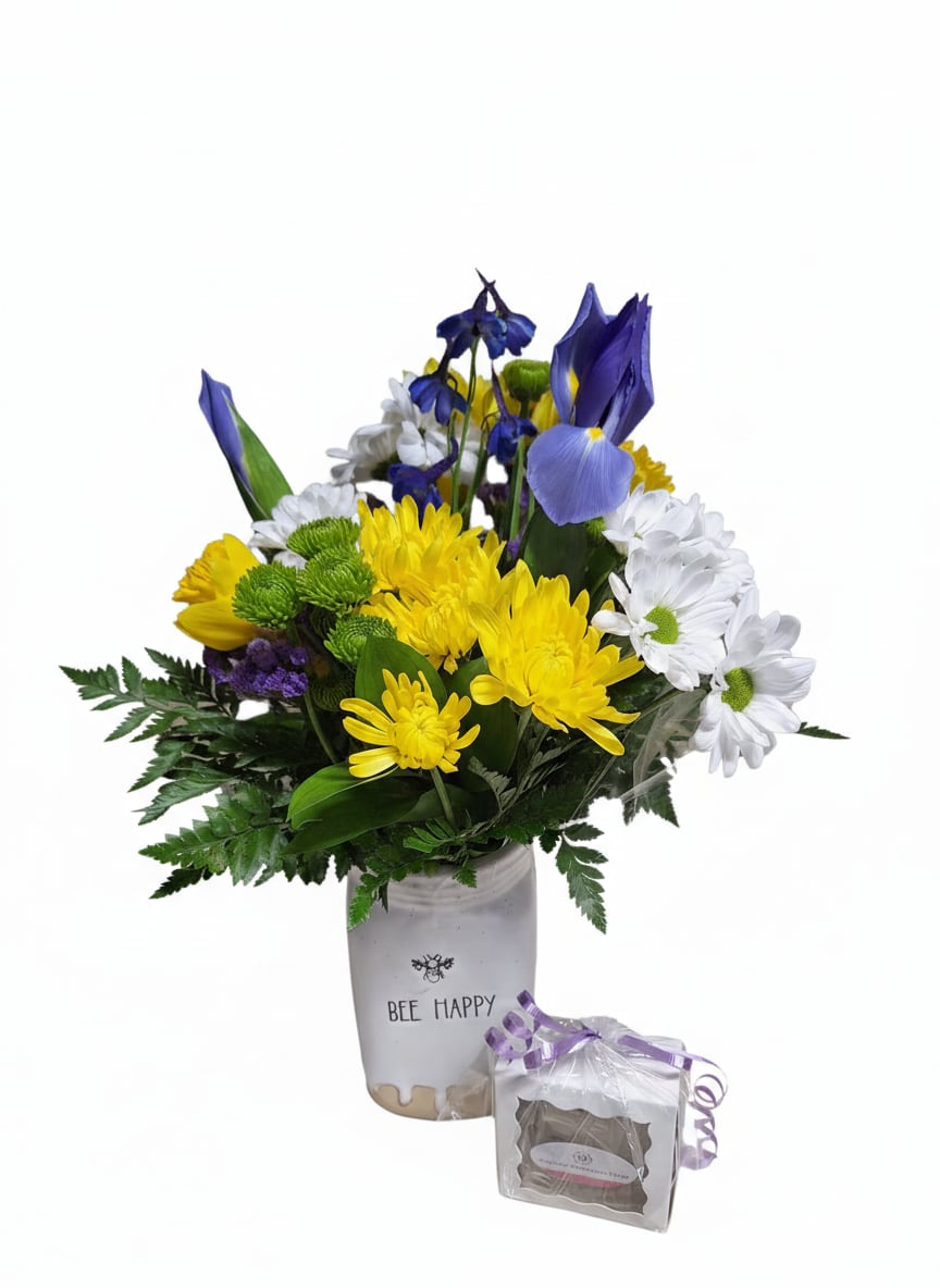 Busy Bee Bouquet - Bee Happy mason jar filled with iris, daisys, green buttons, yellow chrysanthemums, daffodils and purple status. Arrangement comes with Ralphina's homemade fudge