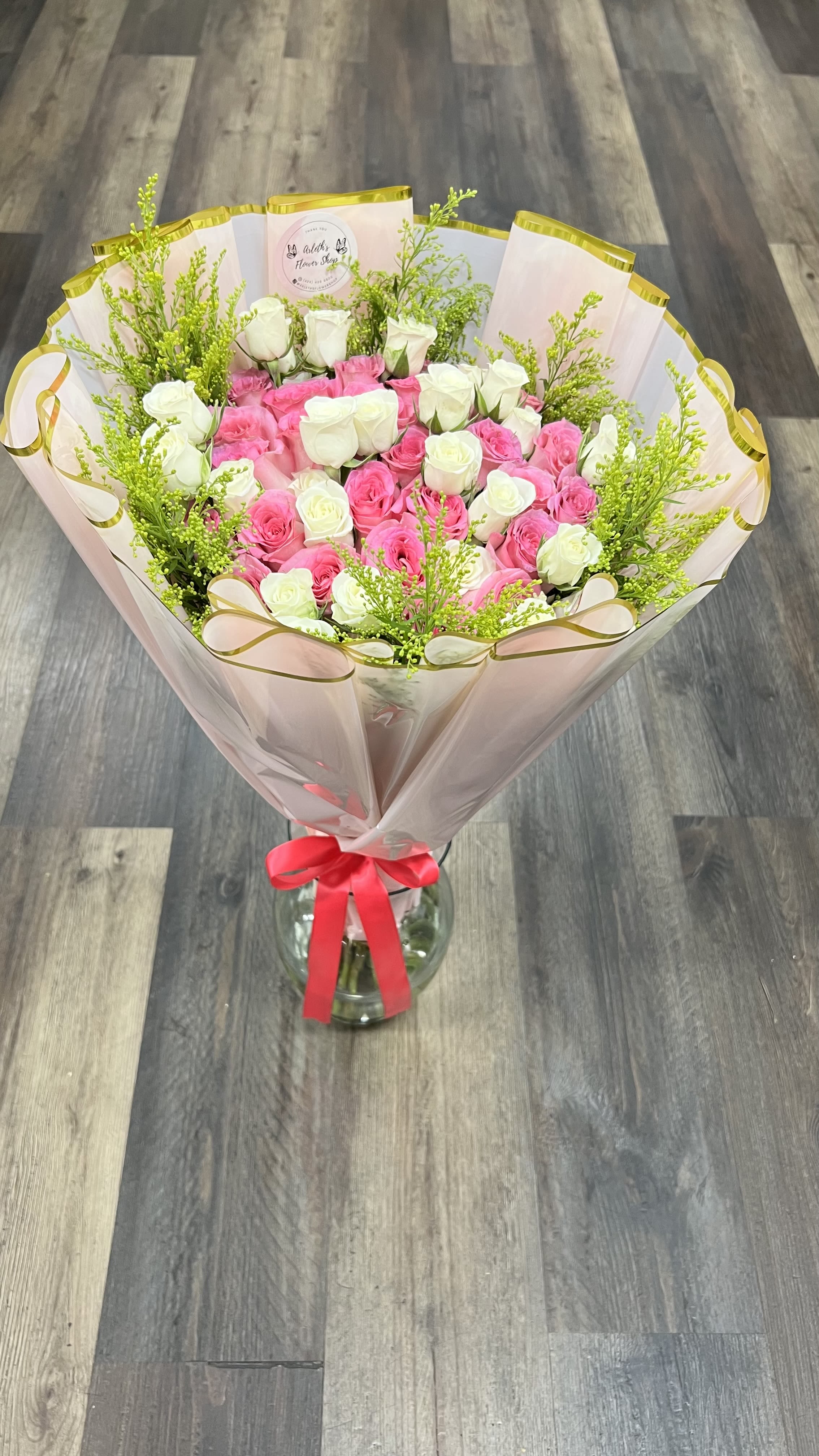 25 Pink Roses And White Spray Roses Bouquet - Buyer will receive 25 Pink Roses Plus White Spray Roses.