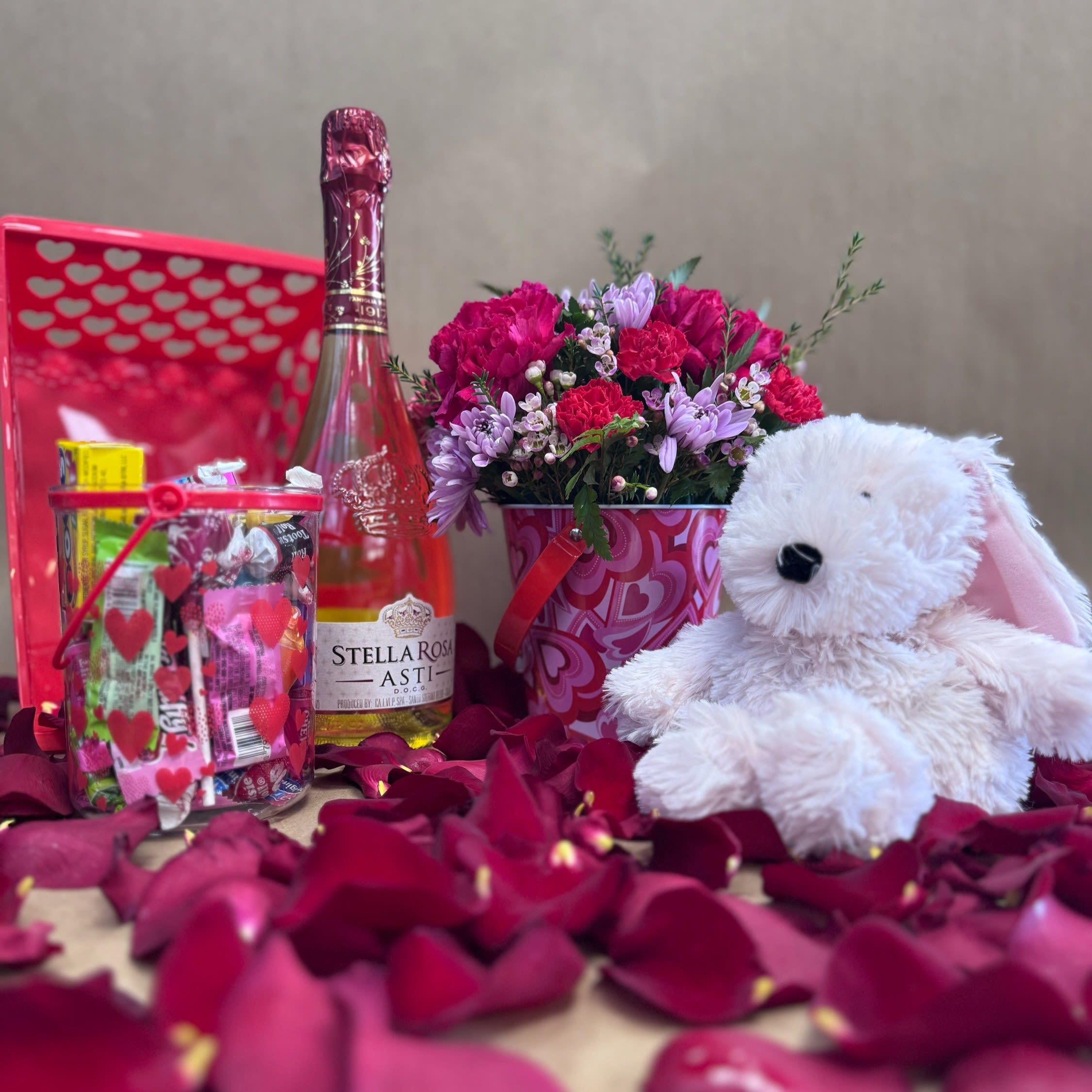 Hey, Sugar - Included: (1) Warmie (1) bucket with flowers (1) bucket of mini chocolate/candy (1) sparking wine or wine  Please note that refunds are subject to a 10% processing fee, or up to $25 for all cancellations  processed.