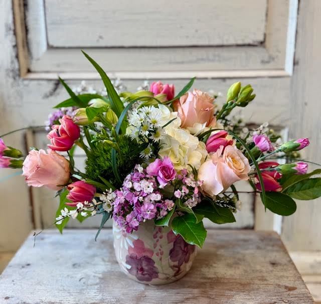 Abundant Blooms - Send this gift of abundant blooms in a ceramic bowl to someone special! The mix of seasonal flowers will vary with our inventory but will be selected to coordinate with the beautiful floral pattern on the 5x5" bowl. 