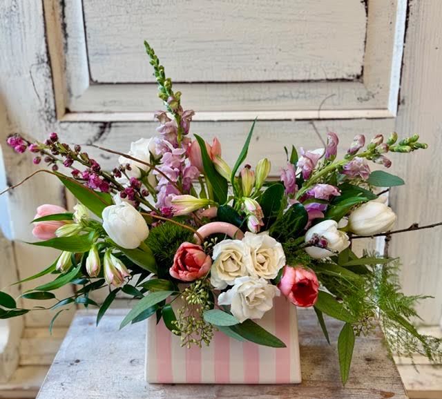 Striped Handbag Vase - This is a unique way to send both flowers and a keepsake container. The striped ceramic handbag vase measures roughly 8x8x3 and is perfectly suited to hold an array of spring flowers.