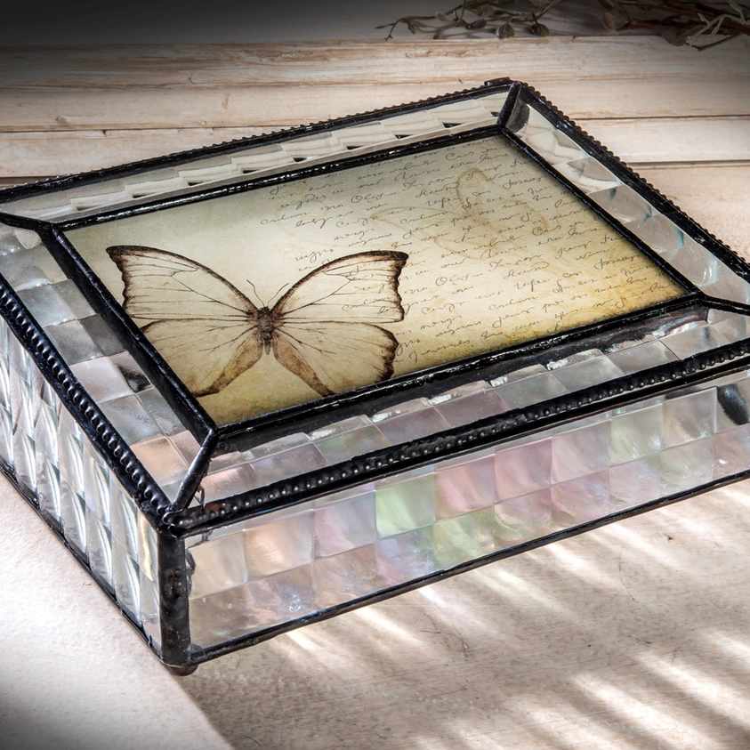 HER- J Devlin Box with Cross Reed Glass - J Devlin &amp; Kathy Gustafson brings this piece of art. The metal trim and solder have been antiqued with a charcoal patina and waxed keeping the finish beautiful for years to come.  Polish with a soft dry cloth. 8 1/8" x 6 1/8" x 3" This keepsake box can hold special mementos, jewelry and tokens and has a classic clear cross reed design. The butterfly picture can be replaced with a 4 x 6 photo of your choice. 