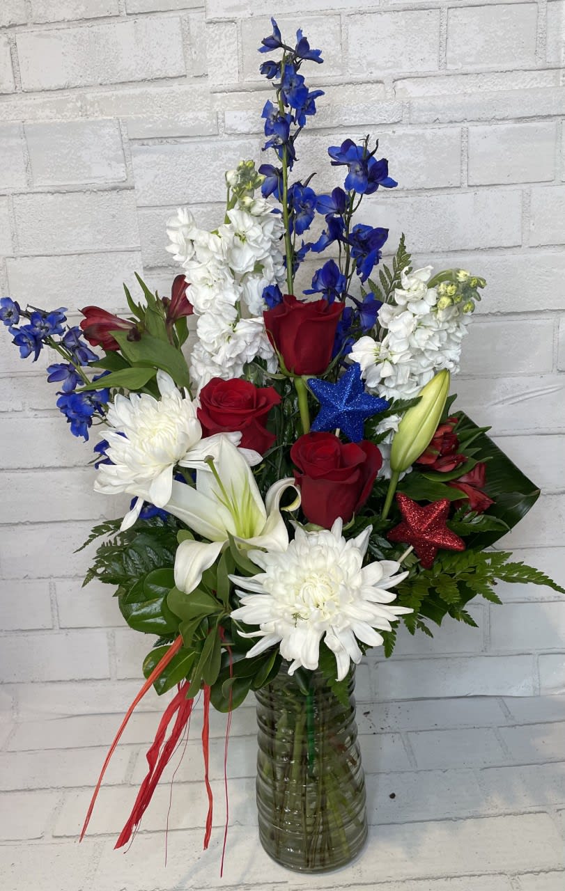 Home of the Brave  - Let Freedom Ring with a Bold red, crisp white, and striking blue florals are front and center, symbolizing valor, purity, and perseverance.