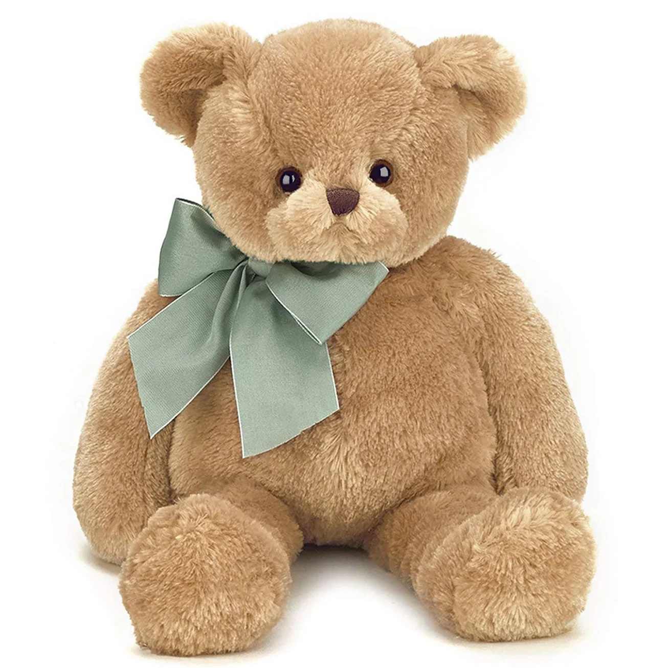 Plush teddy bear with a large ribbon bow