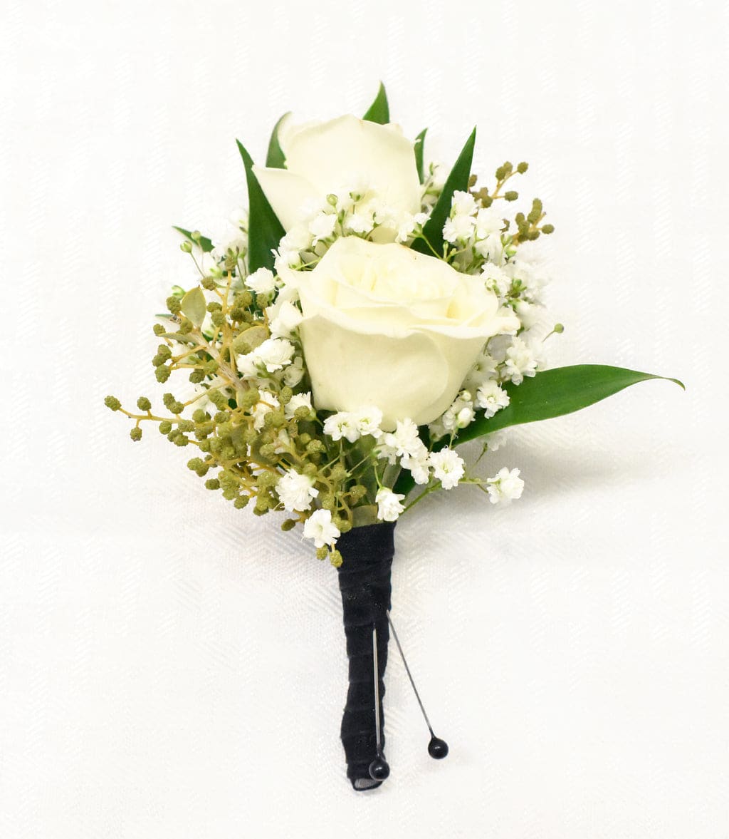 Rose Boutonnière - A classic white  rose boutonnière that compliments any suit. A perfect addition to any prom, formal, or wedding event.   Please state what color of rose and ribbon you would like when ordering