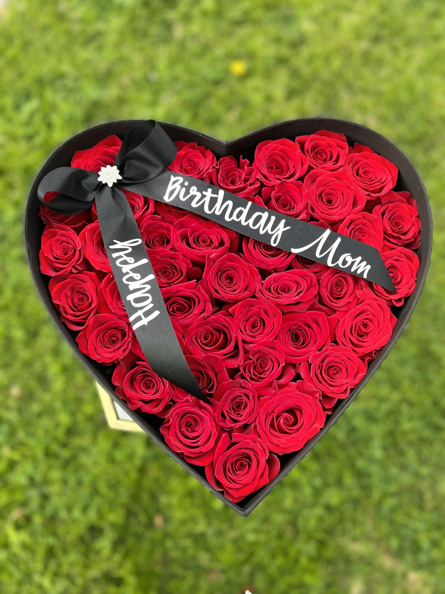 "My Big Heart" - Heart Box with 24 Red Roses, includes black bow with a personalized message.