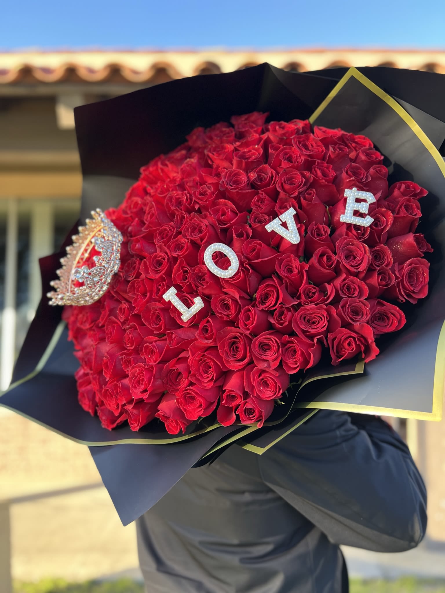 Bouquet ''Buchona 1st level'' 100 Red Roses  - Bouquet of 100 ''Buchon'' style Red Roses, with the letters L O V E included and a 6'' Golden Crown