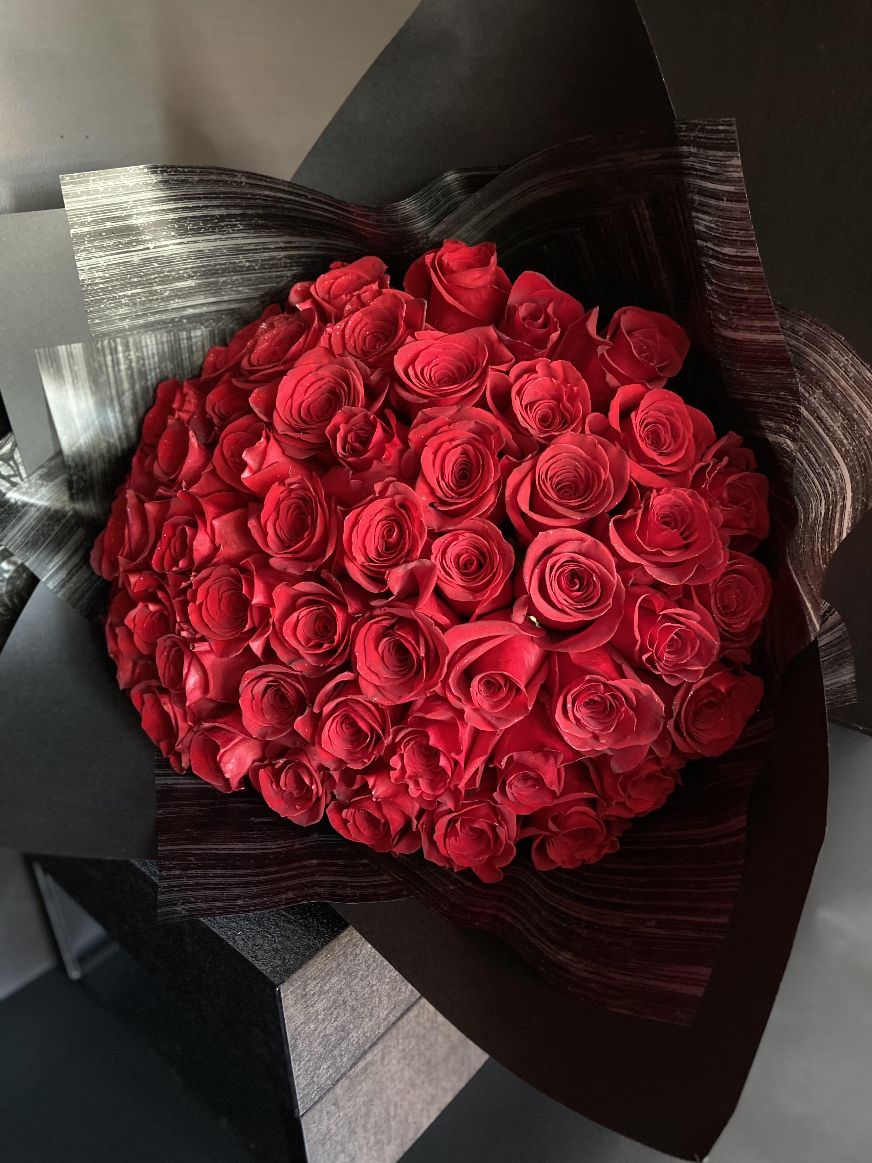 Bety 50 Bouquet - 50 Red Roses with Wrapped Black Paper