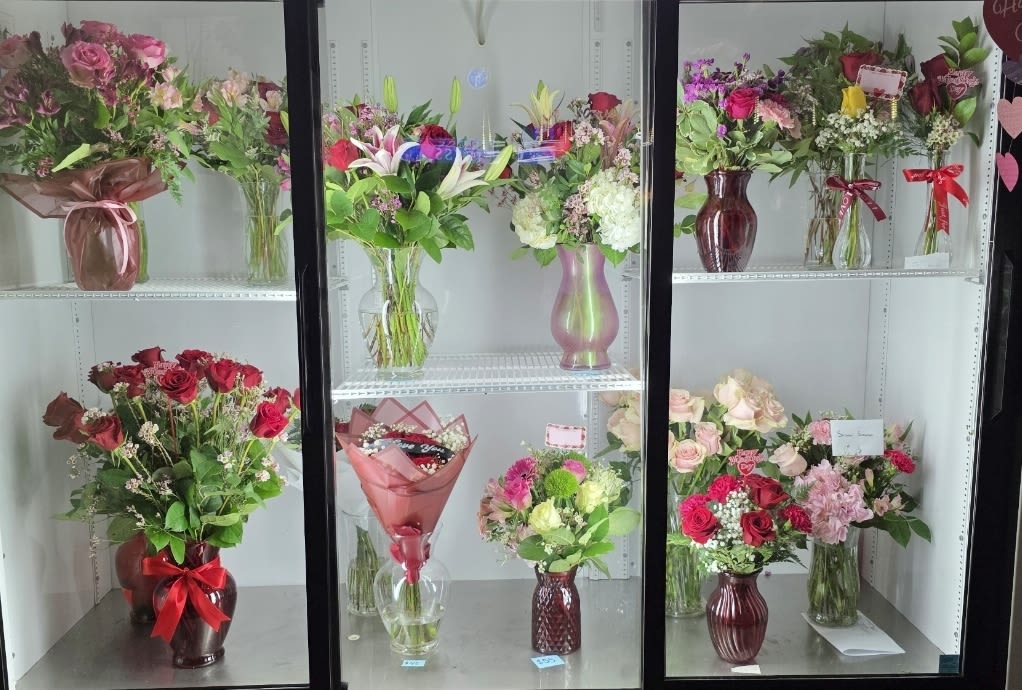 Designer Choice  - Let our designers create something beautiful just for you!  Each arrangement is uniquely crafted using the freshest seasonal flowers available in the shop. Colors, flower varieties, and vase style may vary, but every design is made with care to deliver a stunning and elegant surprise perfect for any occasion.