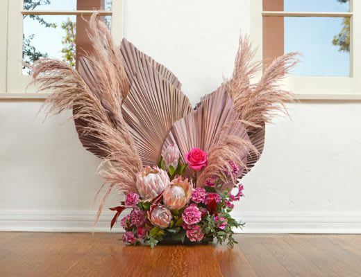 Custom Dried Valentines Bouquet - A beautiful and unique design using pampas grass, dried palm leaves, protea, roses and carnations with lush greens. Standard design is pictured. Flowers added for deluxe and premium versions.
