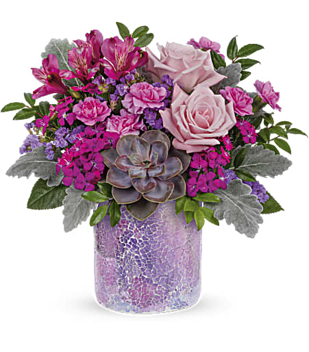 Teleflora's Lovely Shine Bouquet - As magical as sunset in the desert. Luscious pink roses and a sculptural succulent get the glamorous treatment in a shimmering mosaic glass vase. 