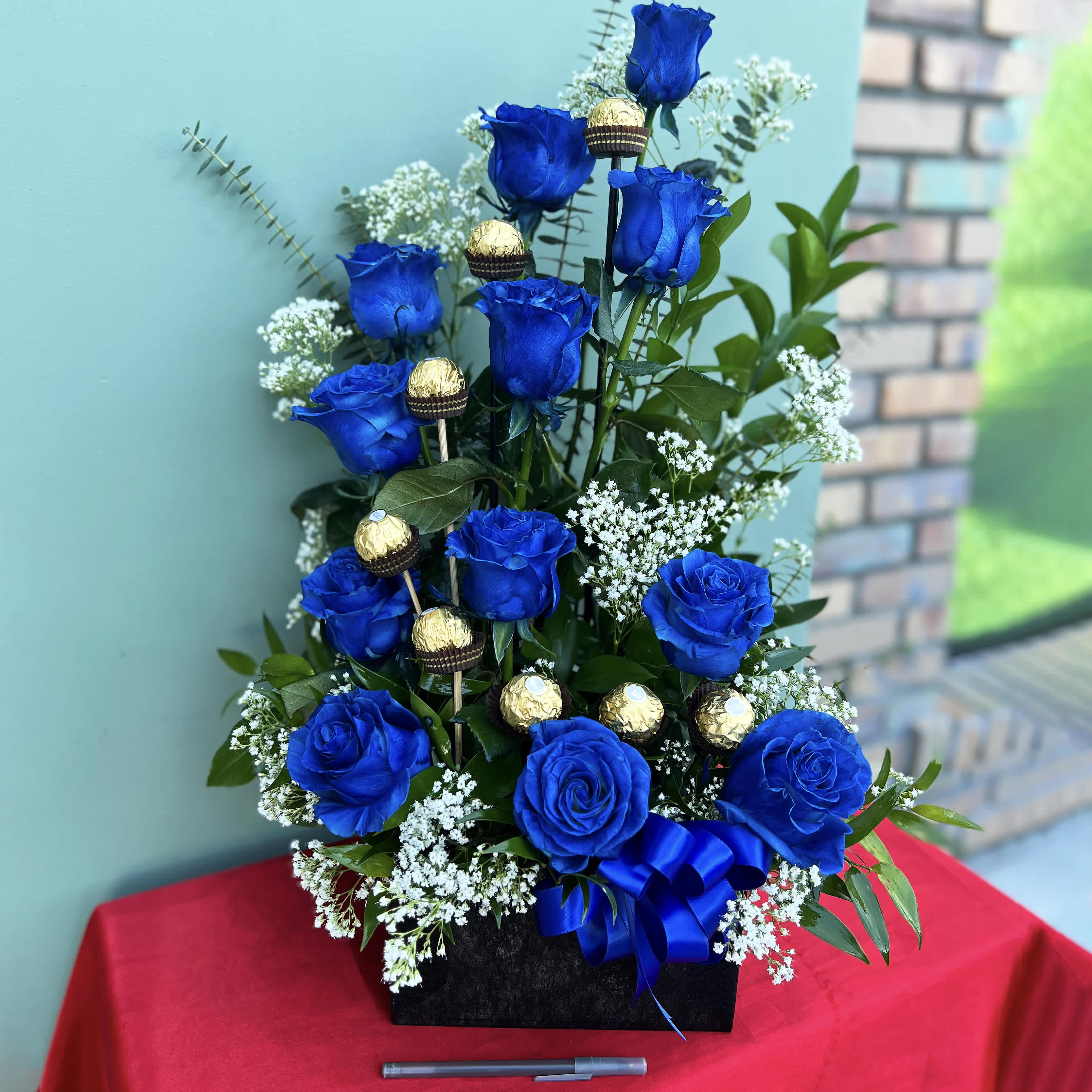 Blue Soul - A symphony or roses delicately arranged with delicious Ferrero Rocher chocolate. Beautiful and scrumptious at the same time :D