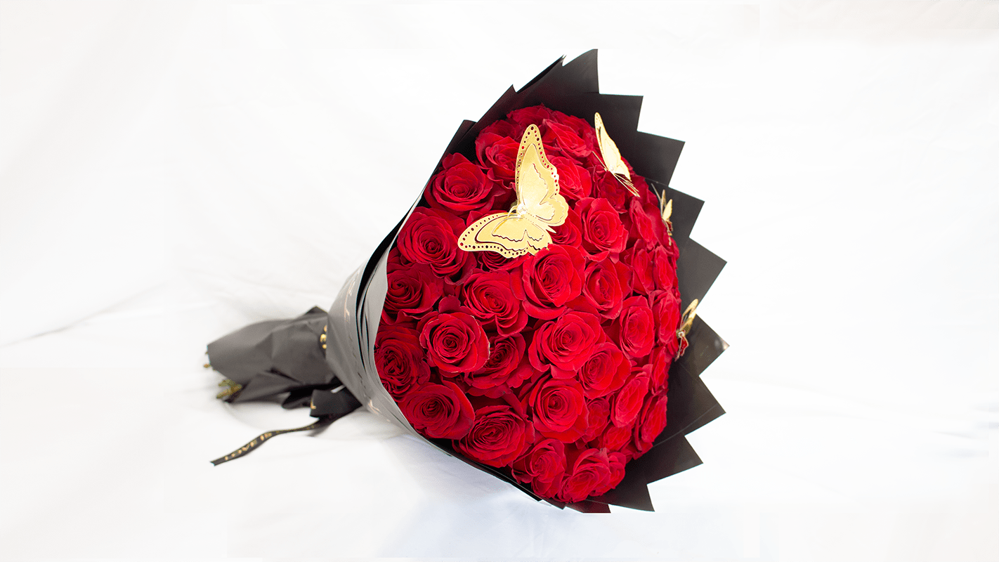 100 Red Roses Ramo Buchon with Butterflies - Our hand-tied bouquets are delicately arranged combining pure Ecuadorian roses top with butterflies!