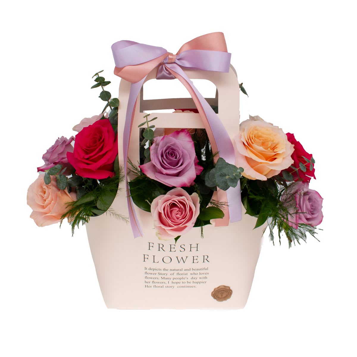 So sweet - Charming and elegant, this beautiful arrangement features a soft mix of  roses in  multiple shades accented with fresh greenery. Designed in a stylish flower bag and finished with a delicate satin bow, it offers a modern yet romantic presentation that’s easy to carry and display.