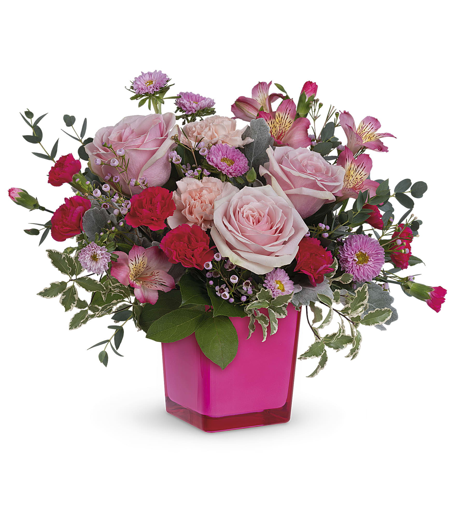 Rosey Moment - Make the moment magical with this joyful pink rose bouquet in a keepsake fuchsia glass cube.  Pink roses, dark pink alstroemeria, pink carnations, miniature hot pink carnations and pink matsumoto asters are arranged with lemon leaf, pink waxflower, dusty miller and pitta negra. 