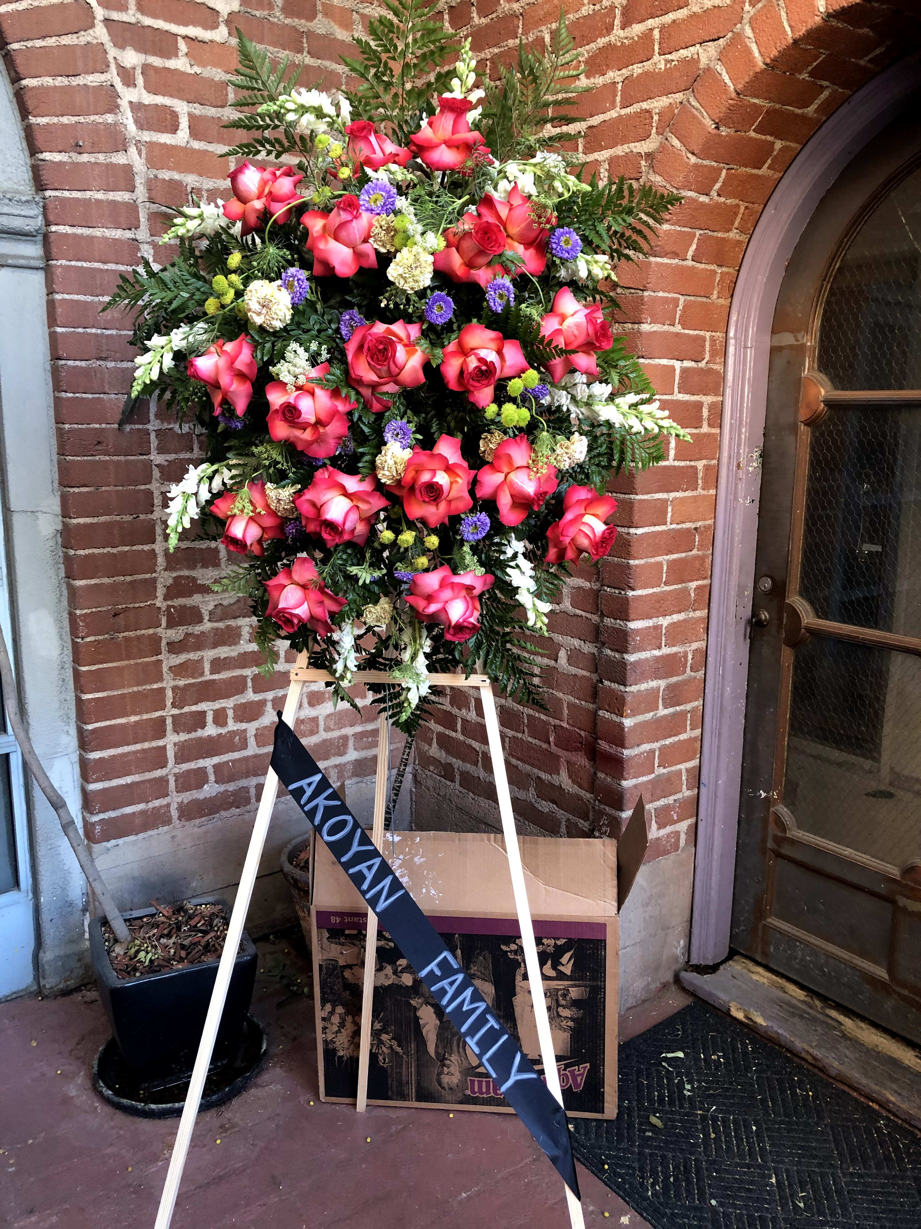 Eternal Bliss -  Santa Clarita Valley Florist - This sympathy easel is designed to offer eternal bliss for a lost loved one. 