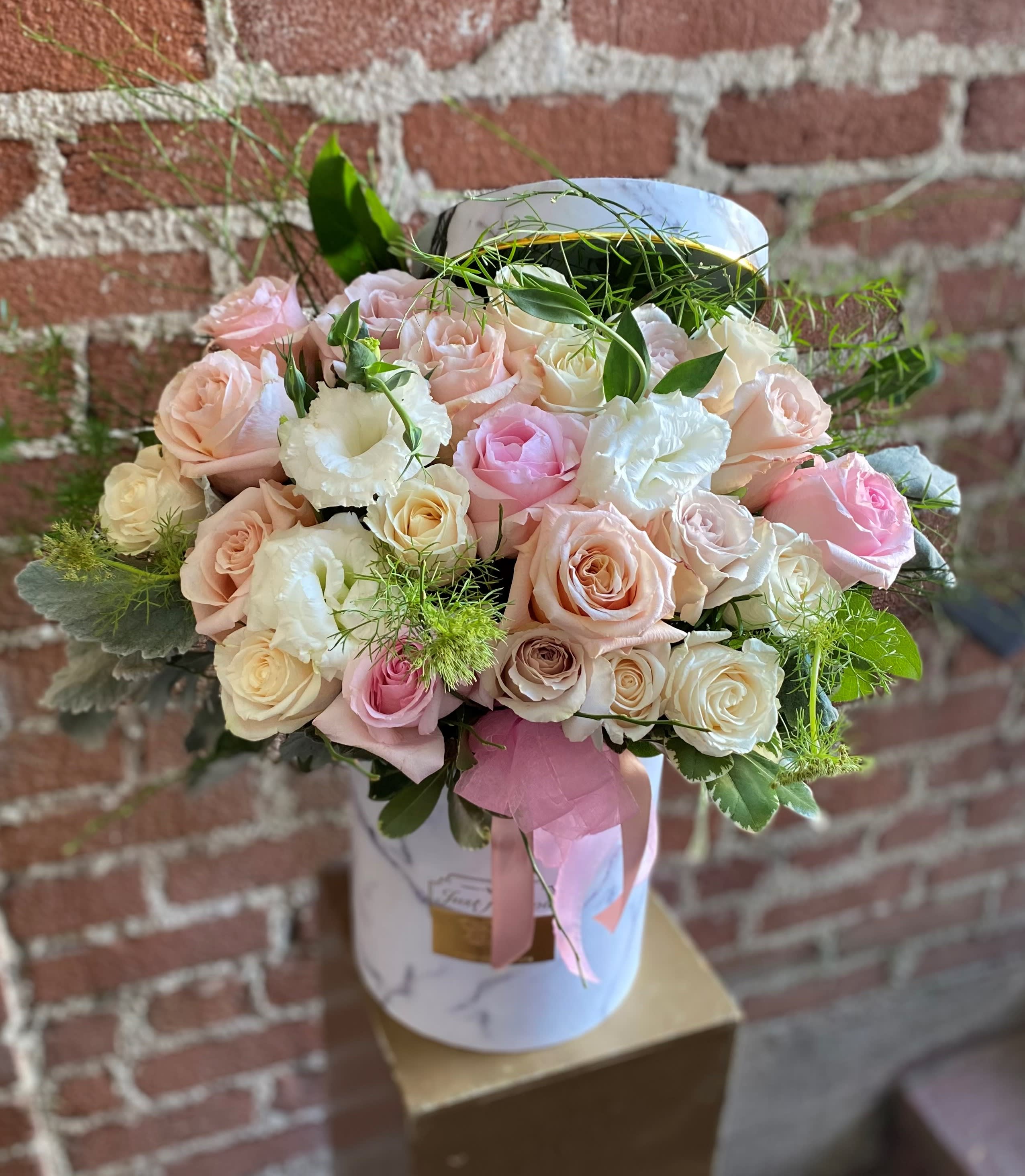 Box Delight -  Santa Clarita Valley Florist - This beautiful arrangement is designed to deliver happiness to a loved ones day. Filled with beautiful flowers in a red box and customized to perfection, this arrangement is a showstopper! If you want to turn heads then this is the arrangement for you!