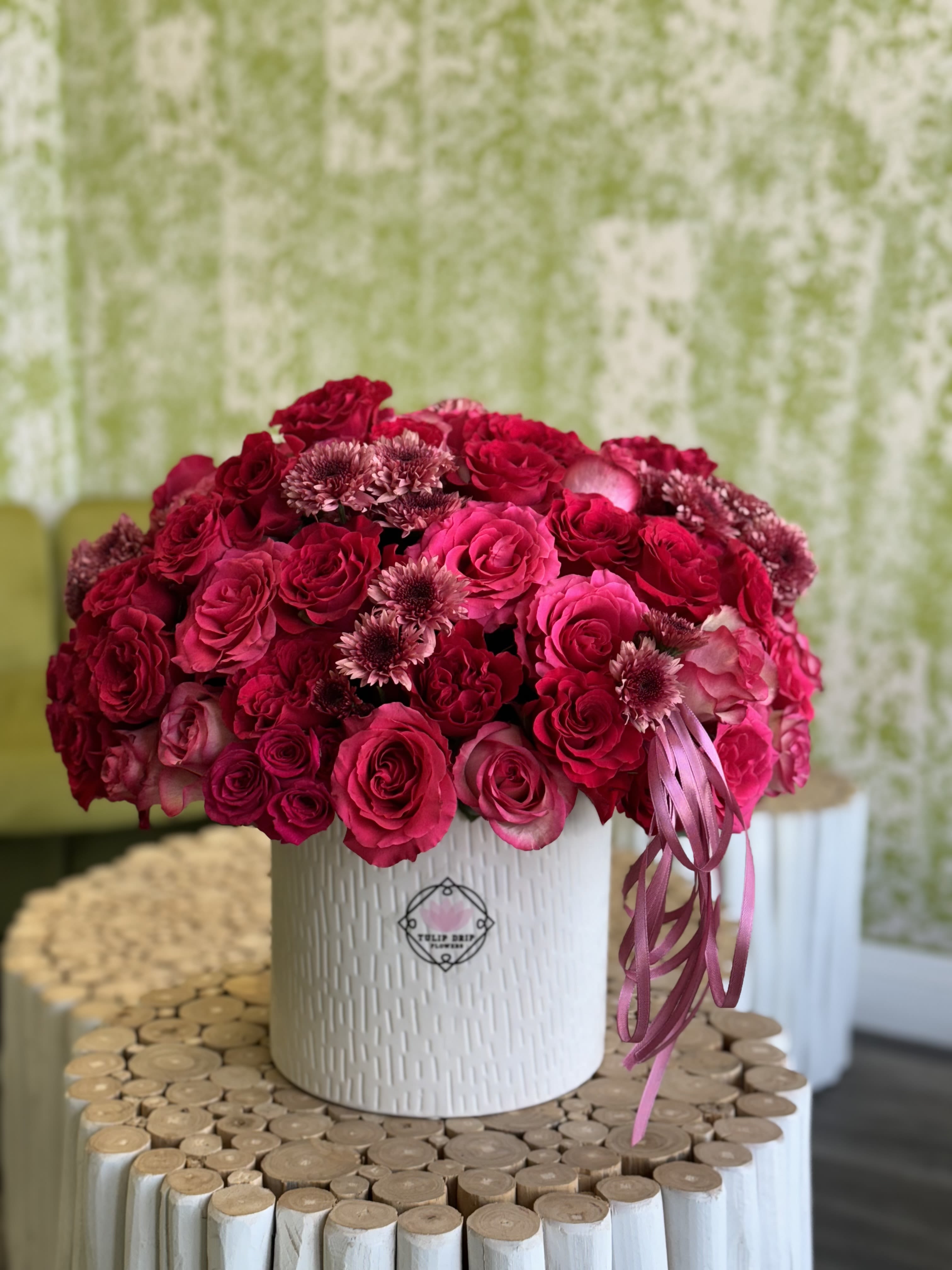 Rose Royale - A lavish collection of rich pink and deep burgundy roses arranged in a luxurious white box with cascading ribbons. A sophisticated choice for anniversaries, Valentine’s Day, birthdays, or an extravagant romantic gesture.
