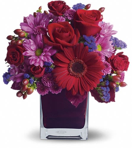 It's My Party by Teleflora - The only crying that this plum party arrangement might inspire are tears of joy! So fabulous. So fun. So fall with its jewel-toned modern cube that's chock full of gorgeous red purple and perfect flowers. Red roses and gerberas dark red spray roses lavender chrysanthemums purple statice and red hypericum are beautifully arranged in a plum cube vase. So get the party started!Approximately 10 1/2" W x 12" H Orientation: One-Sided As Shown : T173-1ADeluxe : T173-1BPremium : T173-1C