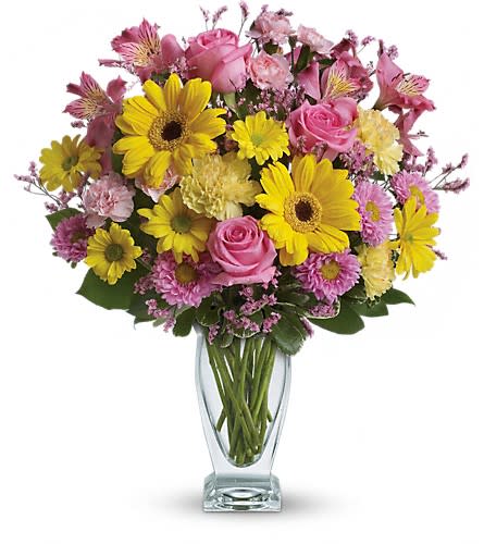 Teleflora's Dazzling Day Bouquet - Dazzle someone special with a stylish and bright bouquet! These delightful blossoms in shades of pink and yellow are delivered in a gorgeous glass vase. Pink roses yellow gerberas and daisy spray chrysanthemums dark pink alstroemeria light yellow carnations light pink matsumoto asters and miniature carnations are a mere sampling of what's included in this dazzling gift. Delivered in a glass couture vase.Approximately 17" W x 19" H Orientation: All-Around As Shown : T21-1ADeluxe : T21-1BPremium : T21-1C
