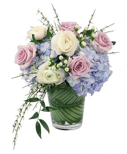 PLEASANT PEACE VASE ARRANGEMENT  - Soft and airy, this bouquet is sure to stun! Featuring a beautiful blue hydrangea, white ranunculus, lavender roses, and more, Pleasant Peace is a delicate pastel mix. Perfect for any occasion, send this delightful bouquet to someone you love today! 