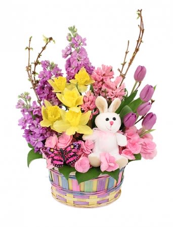 HIPPITY HOP EASTER BASKET  -  A tiny cute bunny and her butterfly pal sit among lavender tulips, yellow daffodils, lavender stock, pink hyacinth and pink hydrangea. This Easter arrangement is waiting to hop over to your celebration! Send these eggcellent flowers today!