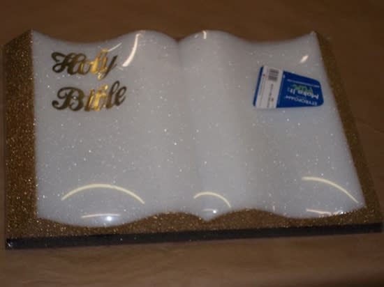 Foam 12" Bible - Our 12" foam Bible can be placed on top of a casket spray or worked around an urn arrangement.  Overall size is 12" X 7 3/4" X1/2 in with gold letters and gold edges. This is an add on item for your sympathy needs.