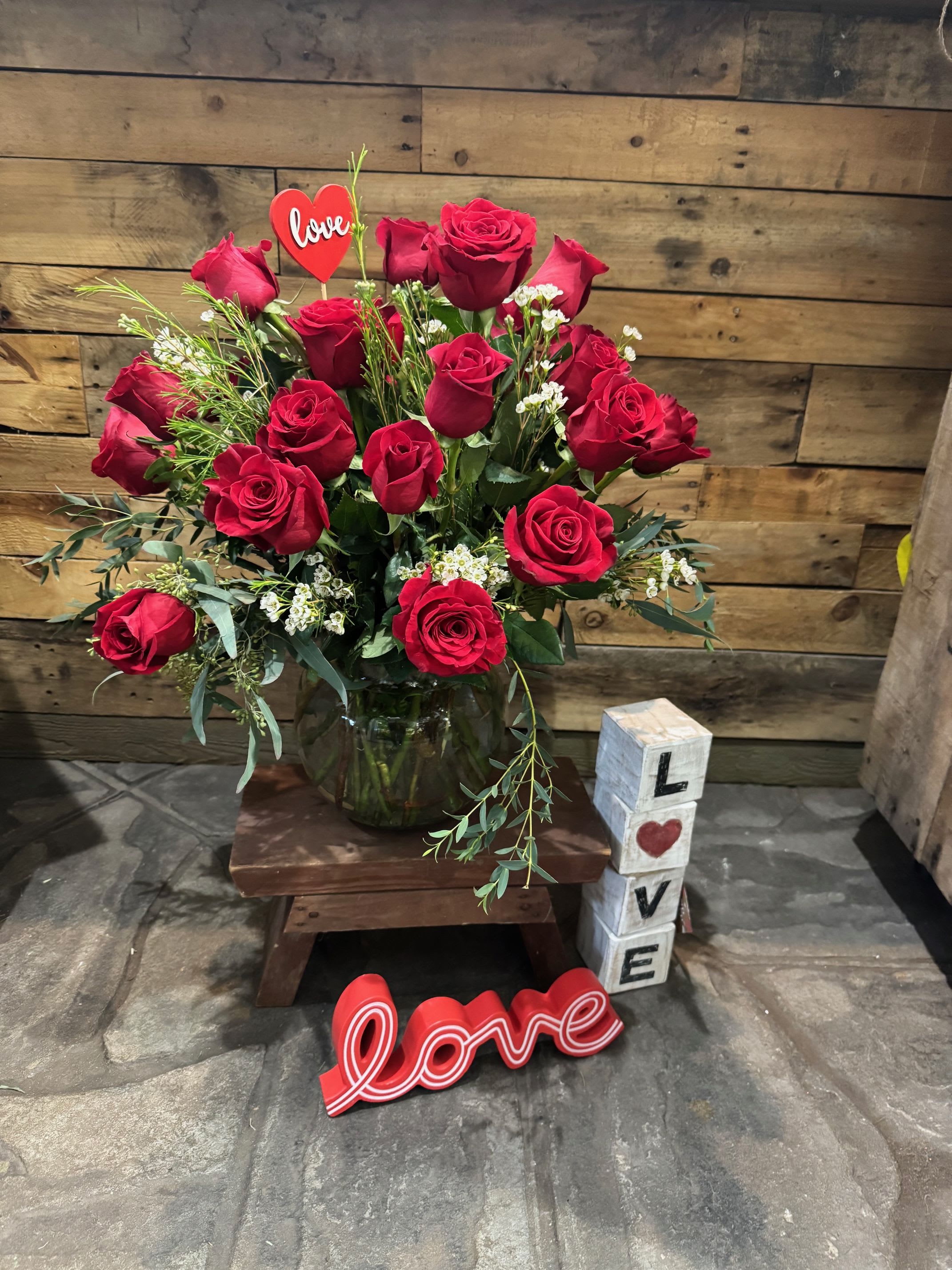 2 Dozen red    Cluster Roses - Gorgeous 2 dozen Ecuadorian red roses with a touch of wax flowers and some eucalypts. 