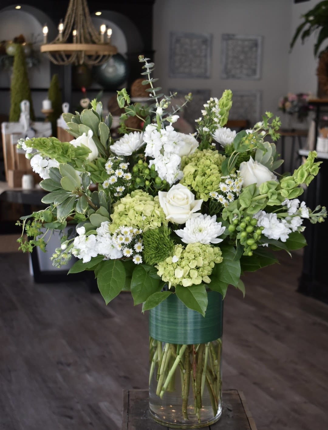 Luck of The Irish - Each arrangement is custom designed, using seasonal, best-of-day blooms. The image shown represents its size, style and temperament, however certain flowers may be substituted to achieve the best quality and longevity for your florals.