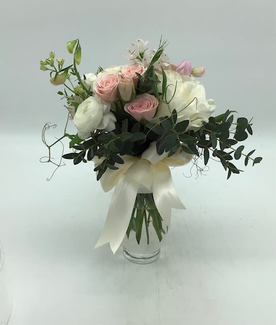 Prom Bouquet - The latest trend is to give a small bouquet of flowers to match the dress in lieu of a corsage.  Our Designer's Choice  Prom Bouquet will be made of the most appropriate flowers in colors you request.  A photo can be sent to you upon request.