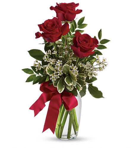 Thoughts of You Bouquet with Red Roses - It's the thought that counts but it counts a bit more when it is expressed with three gorgeous red roses in a lovely arrangement tied up with a red satin ribbon. The flowers are bright and the price is right - the perfect combination for a sweet surprise. This charming bouquet includes three red roses accented with white waxflower huckleberry and pittosporum along with a red satin ribbon. Delivered in a clear glass vase. Approximately 10 1/2" W x 16 1/2" H Orientation: All-Around As shown. Same Day Flower Delivery